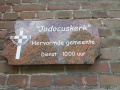 Huidige naambord van de kerk, opname 28-08-2022.